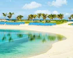 The island is home to three white sandy beaches. T The island is home to three white sandy beaches. The busiest of those is Bertram Beach and the visitors are advised to come early or book a clamshell